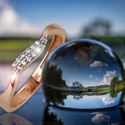 GoldDream Gold Ring Welle Zirkonia weiß Gr.58 333er Rosegold GDR501E58